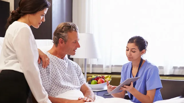 Nurse providing patient and family education at home
